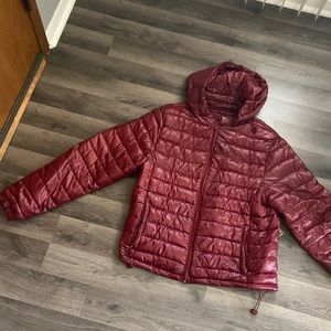 2x,Burgundy puffer jacket.